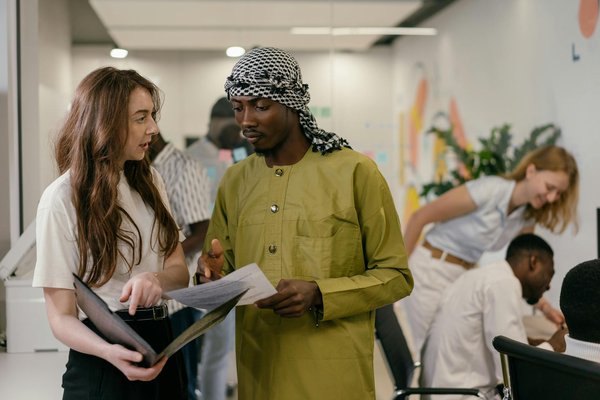 What role does community support play in the success of UK sports initiatives?